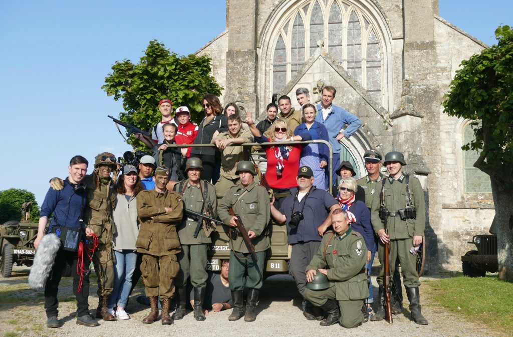 “The Girl Who Wore Freedom” crew in Normandy, France working with a group of re-enactors for the film. Photos courtesy of Savannah Woods