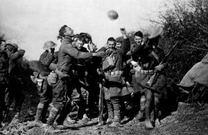 Soldiers celebrating the news of the Armistice.