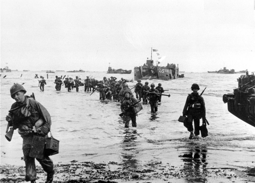 US Troops disembarking on the beaches of Normandy